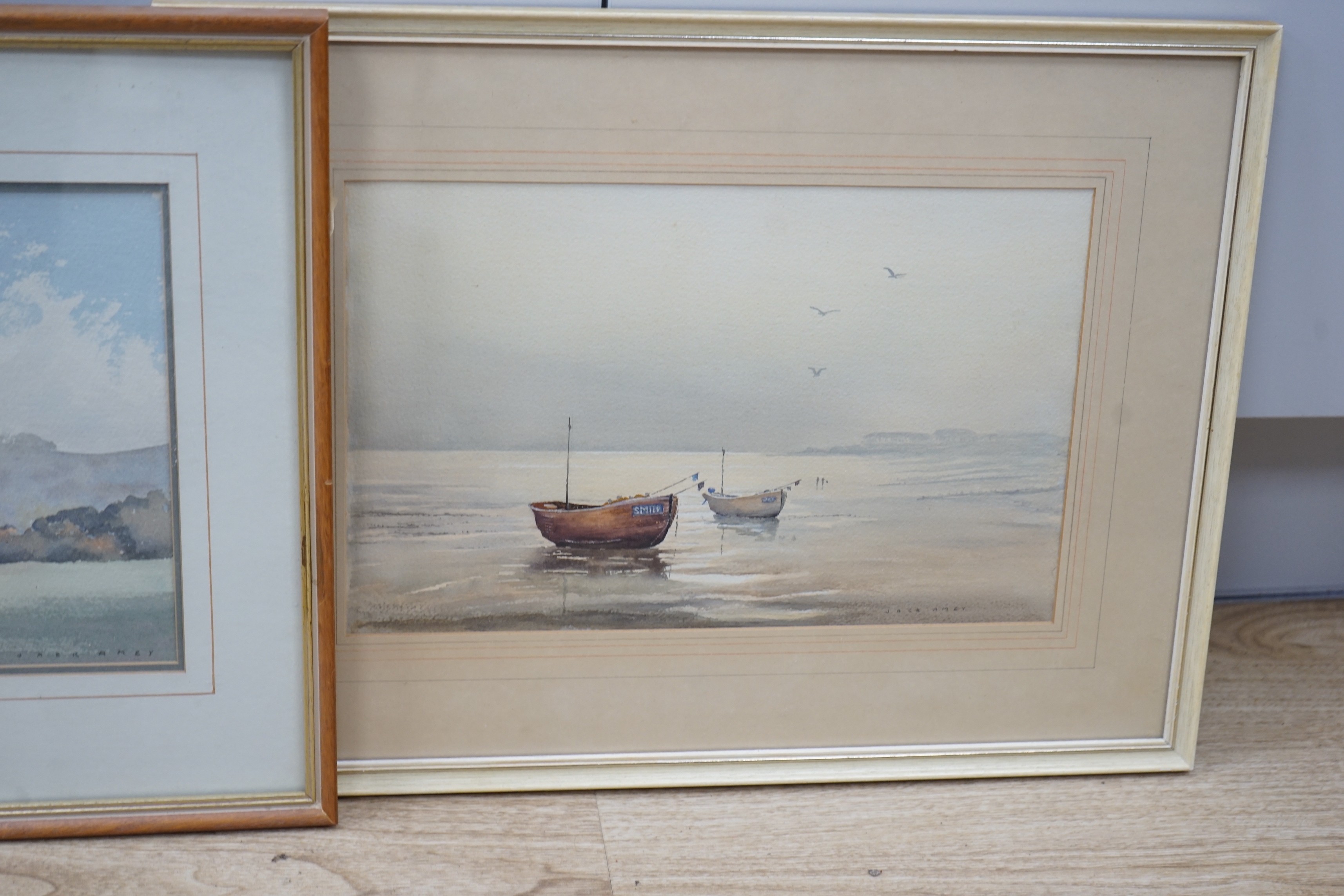 Jack Amey (20th C.), three watercolours, 'Spring at Amberley', 'Cattle at Washington' and 'Beached fishing boats', signed, largest 31 x 47cm